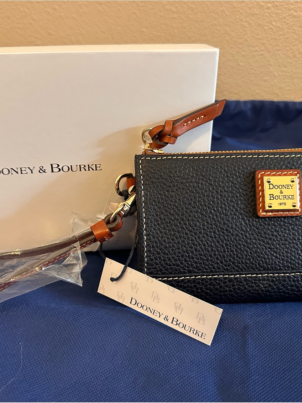 Dooney & Bourke Black Pebbled Leather Wristlet with Brown Trim
